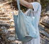 Duck egg blue linen tote bags designed and made for long, comfortable and sustainable use. Whether you're going to the beach, planning a visit to the market, or taking your baked cake to friends, our linen bag is always perfect for you.