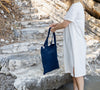 Navy blue linen canvas bags designed and made for long, comfortable and sustainable use. Whether you're going to the beach, planning a visit to the organic market, or taking your baked cake to friends, our linen bag is always perfect for you.