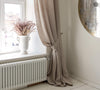 Our natural unbleached linen curtain tie-back is the perfect solution for keeping your curtains looking neat and stylish. Made from the highest-quality European linen, they offer durability and a luxurious feel.